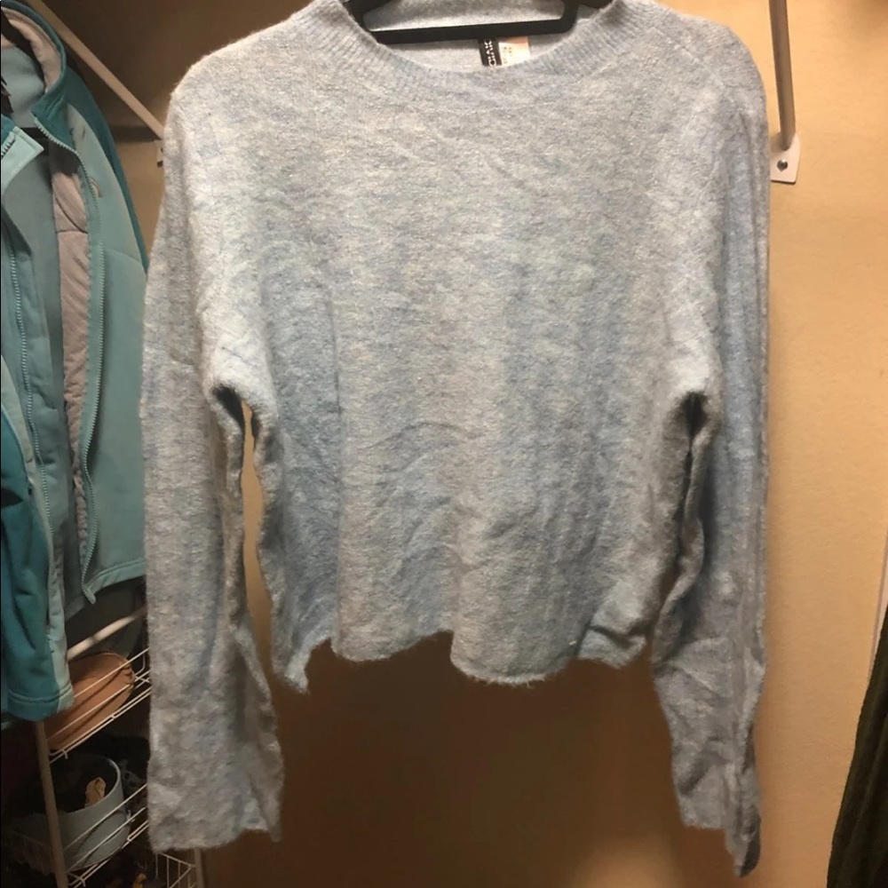 Light blue sweater